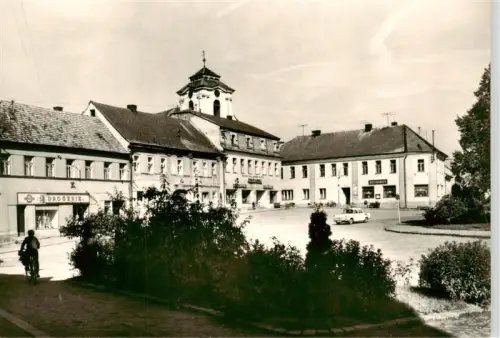 AK / Ansichtskarte Dolni Bousov Mlada Boleslav Jungbunzlau CZ Nám?stí Drogerie Prodejnou-Jednoty Barockgebaeude Marktplatz Fahrrad
