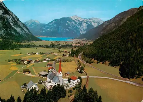 AK / Ansichtskarte Eben Achensee Achensee Kirche Bergdorf Luftaufnahme Alpen Strasse Wiesen Achensee-Perle-Tirols