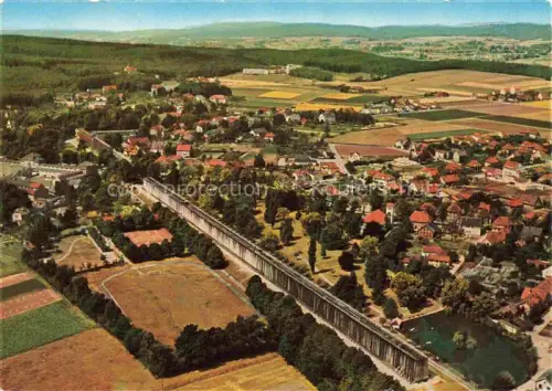 AK / Ansichtskarte Bad Rothenfelde Osnabrueck Niedersachsen Gradierwerk Luftbild Dorf Felder Wald Sportplatz Teich