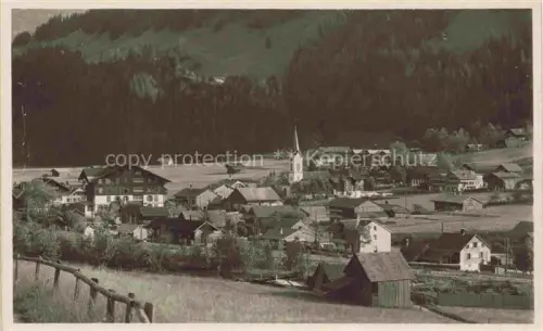 AK / Ansichtskarte Lenk Simmental BE Dorfansicht Kirche Berglandschaft Wohnhaeuser Wiese Wald