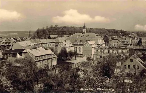 AK / Ansichtskarte Herrnhut Loebau Goerlitz Sachsen Oberlausitz Stadtpanorama Kirche Gruenderzeitgebaeude Baeume Huegel