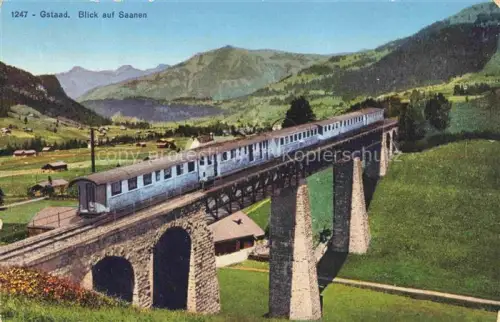 AK / Ansichtskarte Gstaad Saanen BE Blick-auf-Saanen Eisenbahnviadukt Zug Bahn Tal Berge Wiesen Haeuser