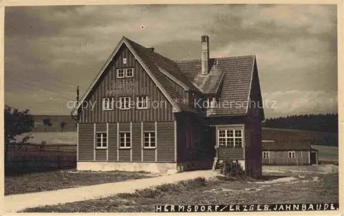 AK / Ansichtskarte Hermsdorf Erzgebirge Sachsen Jahnbaude Gasthaus Holzhaus Erzgebirge Landschaft Holzbau