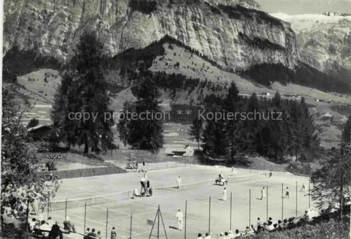 AK / Ansichtskarte Waldhaus Flims GR Tennisplatz Park-Hotel-Waldhaus Tennisspieler Bergfelsen Wald Berge
