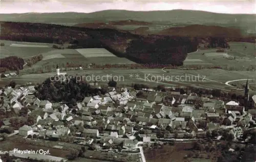 AK / Ansichtskarte Pleystein Neustadt Waldnaab Bayern Kirche Huegel Dorfpanorama Oberpfaelzer-Wald Felder Luftaufnahme Tuerme Erholungsort