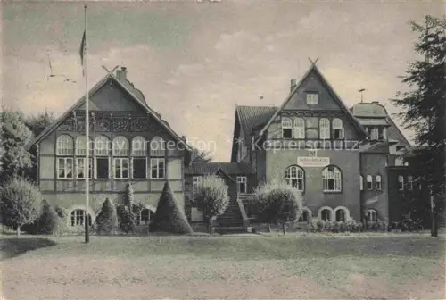 AK / Ansichtskarte Bad Bevensen UELZEN Niedersachsen Jugend-Kur-Heim Fachwerkgebaeude Lueneburger-Heide Flaggenmast Garten