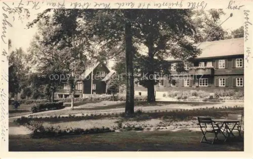 AK / Ansichtskarte Ihringshausen Fuldatal Kassel Hessen Holzhaeuser Garten Baeume Gartenhaus Liegestuehle