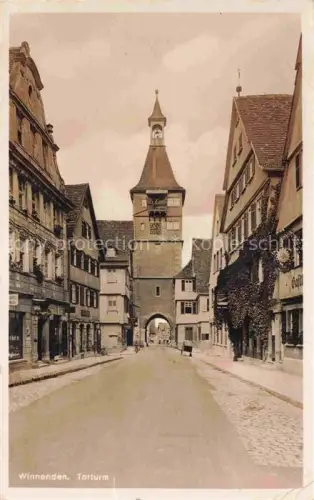 AK / Ansichtskarte Winnenden Torturm Stadttor Hauptstrasse Fachwerkhaeuser Gasse Turmuhr