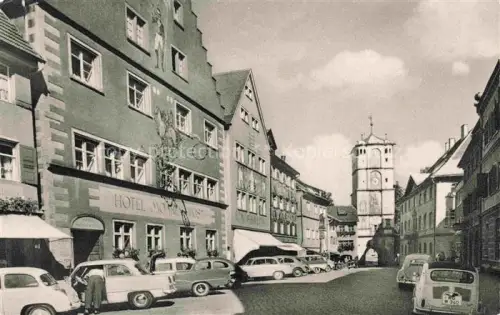 AK / Ansichtskarte Wangen Allgaeu Bayern Herrenstrasse Hotel-Mohrenpost Stadtturm Marktplatz Autos Geschaefte Passanten Fachwerkhaus