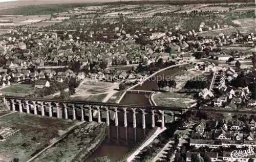 AK / Ansichtskarte Bietigheim Baden Luftbild Viadukt Eisenbahnbruecke Fluss Stadtansicht Wohnhaeuser Felder