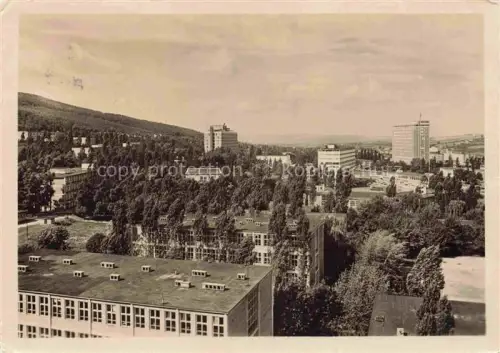 AK / Ansichtskarte Gottwaldov Zlin CZ Industriezentrum Hochhaeuser Verwaltungsgebaeude Baeume Stadtansicht Huegel
