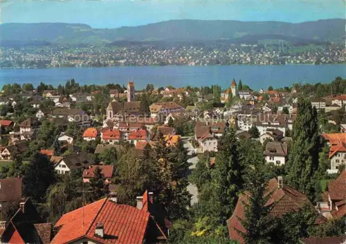 AK / Ansichtskarte KueSNACHT Zuerichsee ZH Kuesnacht Zuerichsee Kirche Ortschaft Daecher Baeume