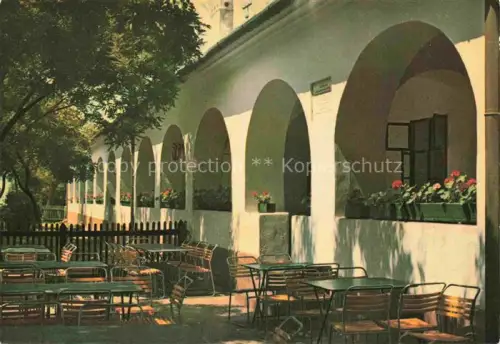 AK / Ansichtskarte Hortobagy Hortobagyon HU Hortobágy Csárda Schenke Arkaden Gastgarten Tische Blumenkaesten