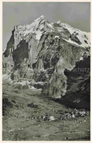 AK / Ansichtskarte Grindelwald BE Wetterhorn Dorf Talblick Berggipfel Schnee Fels Alpen