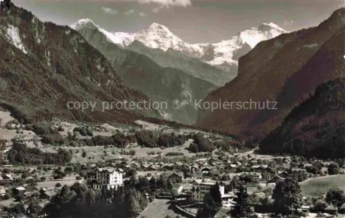AK / Ansichtskarte Wilderswil Wilderswyl BE Eiger Moench Jungfrau Tal Bergpanorama Haeuser Baeume Wiesen Interlaken