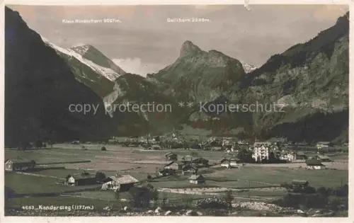 AK / Ansichtskarte Kandersteg BE Klein-Rinderhorn Gallihorn Berge Tal Dorf Wiesen Alpen