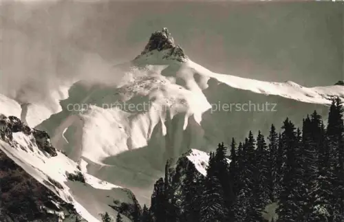 AK / Ansichtskarte Adelboden Frutigen BE Tschinggelochtighorn Kuhnisbergli Schnee Berge Tannen Winter