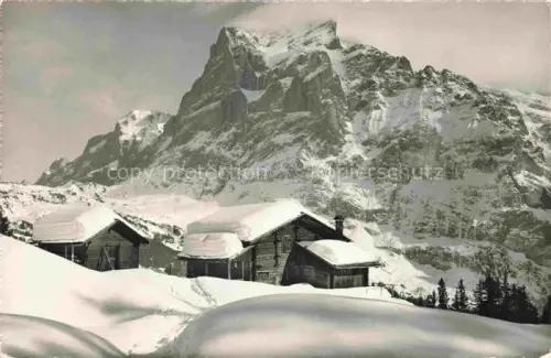 AK / Ansichtskarte Grindelwald BE Wetterhorn Winterlandschaft Schnee Alphuetten Berge Felsen
