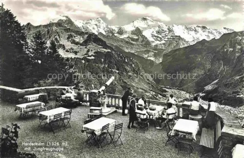 AK / Ansichtskarte INTERLAKEN BE Harderkulm Jungfraugruppe Terrasse Restaurant Berge Gaeste Fernrohr