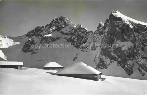 AK / Ansichtskarte Zweisimmen BE Alp-Frohmatt Spillgerten Berge Schnee Alphuetten Winter
