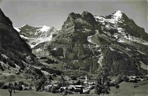 AK / Ansichtskarte Grindelwald BE Kirche Schulhaus Fiescherhoerner Eiger Hoereli Dorf Berge Tal
