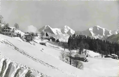 AK / Ansichtskarte Beatenberg Thunersee BE Schnee Winter Berge Haeuser Tannen