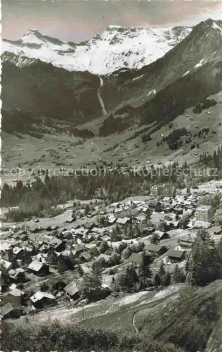 AK / Ansichtskarte Adelboden Frutigen BE Wildstrubel Dorf Berge Tal Panorama Haeuser