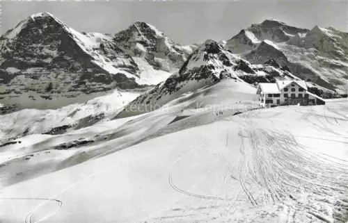 AK / Ansichtskarte Maennlichen 2343m Grindelwald BE Eiger Moench Jungfrau Bergstation Schnee Skipisten Winterlandschaft