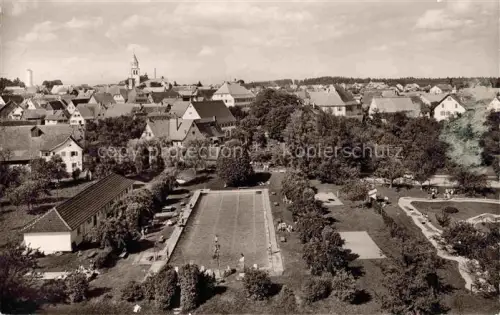 AK / Ansichtskarte Pfalzgrafenweiler Stadtpanorama Schwimmbad Kirchturm Freibad Schwarzwald Wohnhaeuser