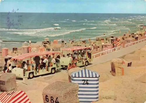 AK / Ansichtskarte NORDERNEY Nordseebad Niedersachsen Nordstrand Strandkoerbe Strandbahn Nordsee Wellen Badegaeste Promenade Duenen