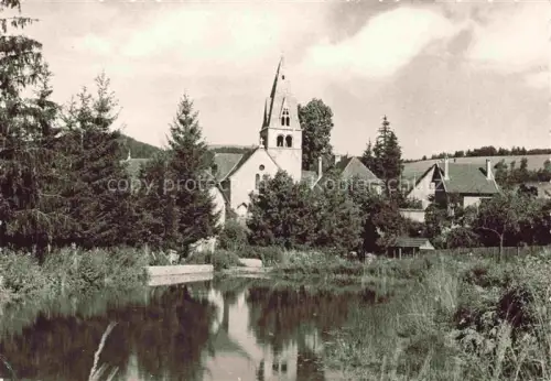 AK / Ansichtskarte Saint-Paul-les-Monestier Kirche Weiher Glockenturm Dorf Tannen Berge Spiegelung