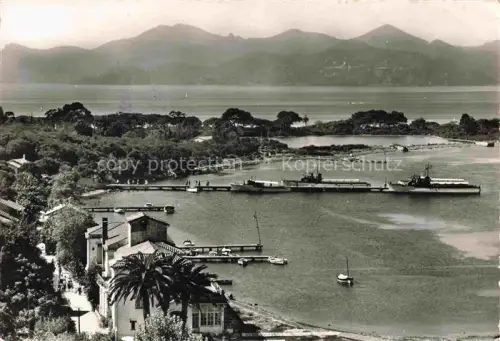 AK / Ansichtskarte Ile Sainte-Marguerite GRAssE 06 Alpes-Maritimes La-Baie Estérel Bucht Pier Boote Berge Palmen