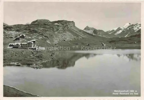 AK / Ansichtskarte Melchsee-Frutt Hotel-Reinhard Bergsee Berghotel Gebirgslandschaft Schneeberge Spiegelung