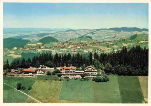 AK / Ansichtskarte Haltenegg 1040m Thun Heiligenschwendi BE Fliegeraufnahme Hotel Felder Wald Huegel Landschaft
