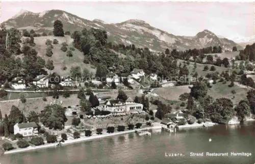 AK / Ansichtskarte Seeburg Luzern LU Strand-Restaurant-Hermitage Seeburg Vierwaldstaettersee Seeufer Hotel Terrasse Berge Luftbild