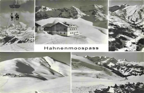 AK / Ansichtskarte Hahnenmoospass 1950m Lenk BE Hahnenmoospass Berghotel Skilift Schnee Winter Berge Skifahrer