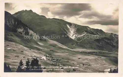 AK / Ansichtskarte Rueras Surselva GR Oberalpstrasse Camischolas Sedrun Tal Berge Dorf Panorama Surselva