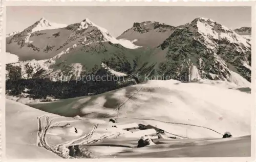 AK / Ansichtskarte AROSA GR Tschuggen Furkagruppe Berge Schnee Alpen Skigebiet Huetten Winterlandschaft