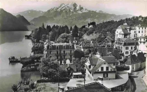 AK / Ansichtskarte Weggis Vierwaldstaettersee LU Pilatus Hotel-Rigi Vierwaldstaettersee See Berge Dorf Uferbebauung