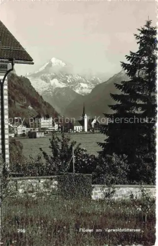 AK / Ansichtskarte Flueelen Vierwaldstaettersee UR Vierwaldstaettersee Kirche Berge Ortschaft Tanne