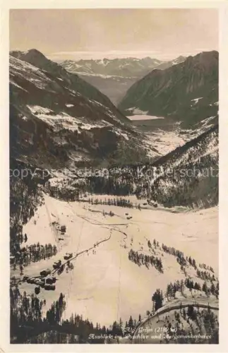 AK / Ansichtskarte Alp Gruem Bernina GR Puschlav Bergamaskerberge Luftaufnahme Berge Tal Winter Schnee Berninabahnstrecke