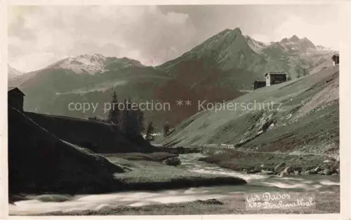 AK / Ansichtskarte DAVOS GR Dischmatal Fluss Bergpanorama Wiese Haeuser Schneeberge Tannen