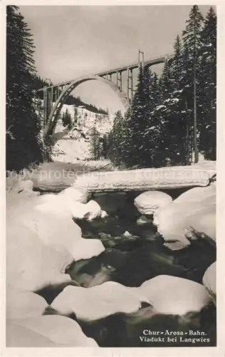 AK / Ansichtskarte Langwies  Plessur GR Langwies-Viadukt Chur-Arosa-Bahn Eisenbahn Bruecke Winter Schnee Fluss Tannen