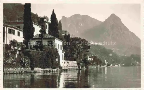 AK / Ansichtskarte Oria  Lago di Lugano TI Lago-di-Lugano Seeufer Villa Zypressen Berge Agaven