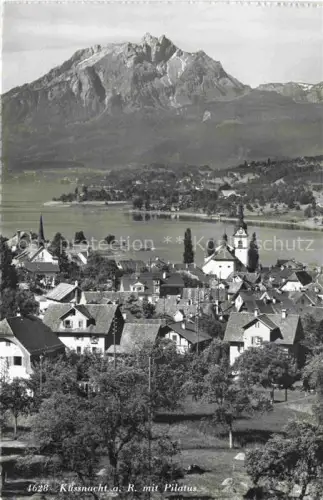 AK / Ansichtskarte KuessNACHT Vierwaldstaettersee SZ Pilatus Vierwaldstaettersee Kirche Daecher Dorf See Berge