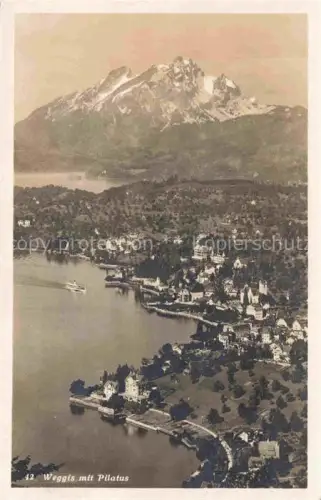 AK / Ansichtskarte Weggis Vierwaldstaettersee LU Pilatus Vierwaldstaettersee Dampfschiff Dorf Luftbild Hotels Seepromenade