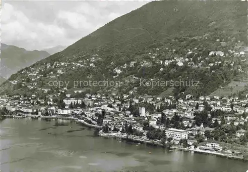 AK / Ansichtskarte Orselina Locarno TI Locarno See Lago-Maggiore Berge Ortschaft Haeuser Kirchturm Flussufer