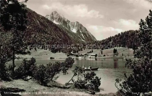 AK / Ansichtskarte MITTENWALD Bayern Lautersee Wetterstein Bergsee Ruderboot Bergwald Alpen Wiesen Berghuetten
