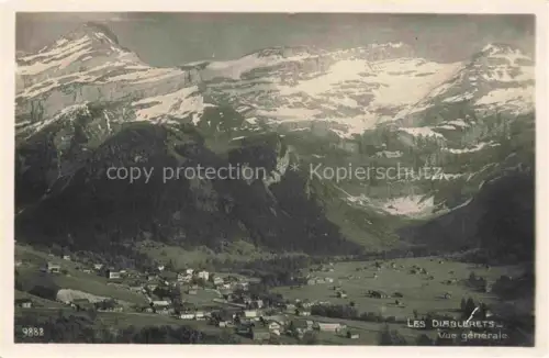 AK / Ansichtskarte Les Diablerets VD Bergdorf Tal Wiesen Alpen Schneeberge Gletscher Panorama Dorfansicht