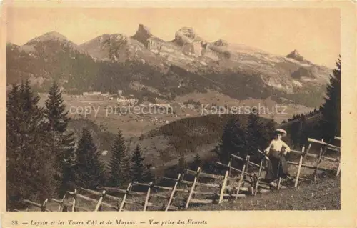 AK / Ansichtskarte Leysin VD Tours-d Aï Mayens Ecovets Bergwiese Zaun Frau Bergdorf Berge Tannen